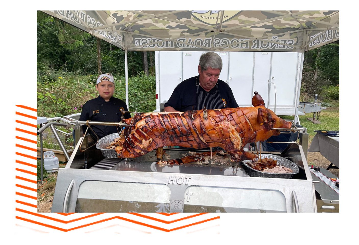 A pig being cooked on top of a grill.