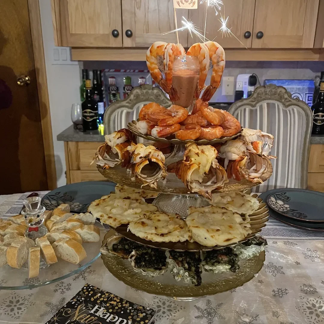 A table with food on it and plates of cheese